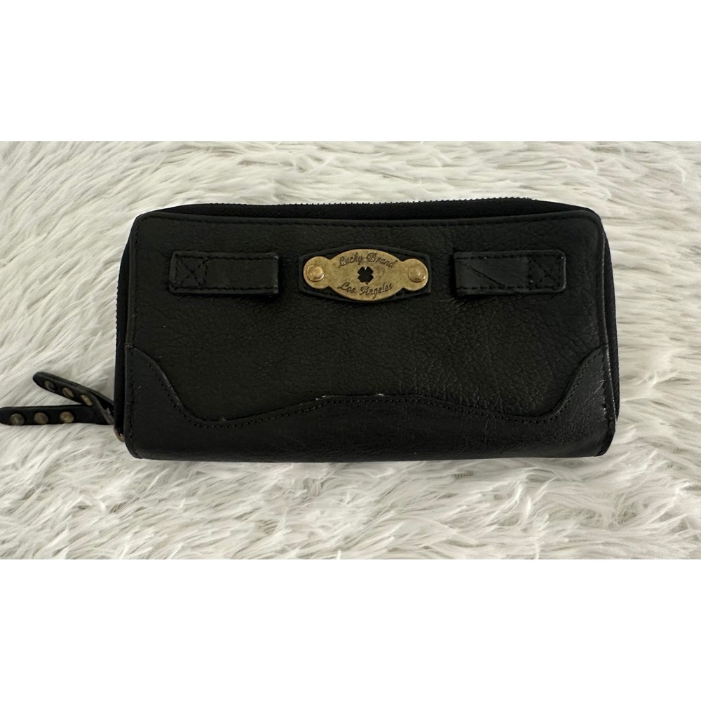 Lucky Brand black leather zip-around wallet with a goldâ plate detail